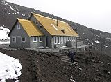 Ecuador Cotopaxi 02-07 Jose Ribas Refuge Outside Peter Ryan made it to the two-story, yellow-roofed, stone building of the Jos Ribas Refuge.